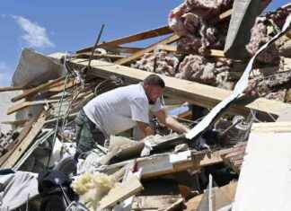 肯塔基和密苏里遭受致命龙卷风袭击的照片